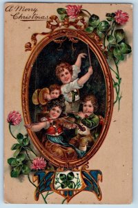 PFB Postcard Christmas Children With Music Instrument Clover Flowers Embossed