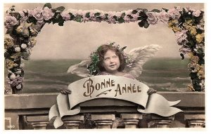 RPPC Bonne Annee Young French Child Angel Wings New Years Hand Colored Postcard