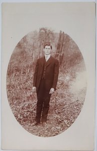 RPPC Handsome Young Man Masked Portrait in Woods  Real Photo Postcard W4