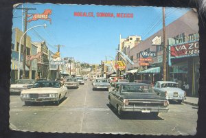 NOGALES SONORA MEXICO DOWNTOWN STREET SCENE 1960s CARS VINTAGE POSTCARD