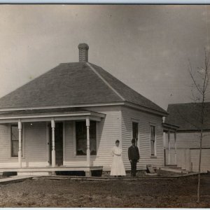 c1910s Cute Small House RPPC Young Married Couple Bowler Hat Man Real Photo A129