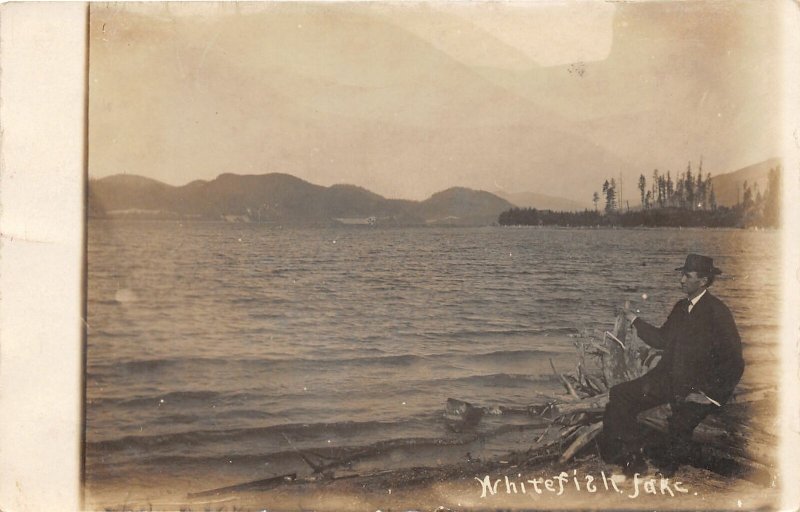 F50/ Whitefish Lake Montana RPPC Postcard 1913 Man on Shore