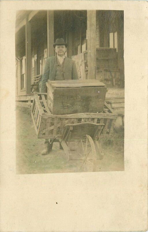 C-1910 Elkton Kentucky RPPC Photo Postcard Man Pushing Wheel Barrow Cart 20-872