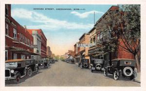 E67/ Greenwood Mississippi Postcard c1920s Howard Street Autos Kantor Store