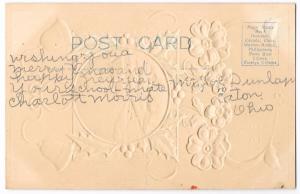 Embossed Christmas Postcard - House With Bells and Flowers - c1910