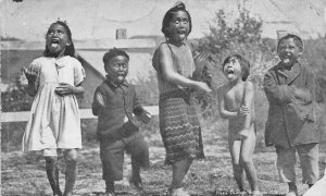 HAKA DANCING MAORI CHILDREN NEW ZEALAND POSTCARD (c. 1910)