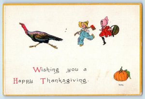 c1910's Thanksgiving Children Chasing Turkey Pumpkin Embossed Antique Postcard