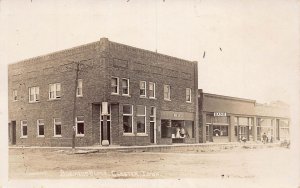 J77/ Chester Iowa RPPC Postcard c1920s Main Street Stores Business 162