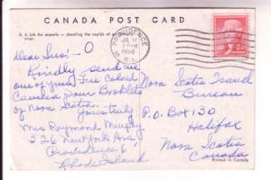 Two Men Canoeing in Rapids in Ontario, Used in US 1956