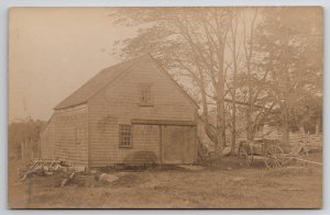 RPPC Small Barn Abandoned Wagon Barrel Debris Real Photo Postcard B43