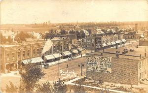 Gaylord MI Dirt Street Store Fronts Great Signage in 1914 RPPC Postcard