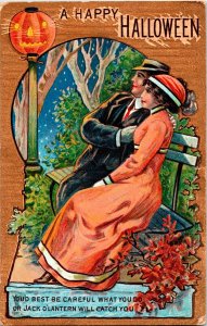 Vintage Winch Back Romantic Couple, Bench, Flower JOL/Pumpkin Halloween Postcard