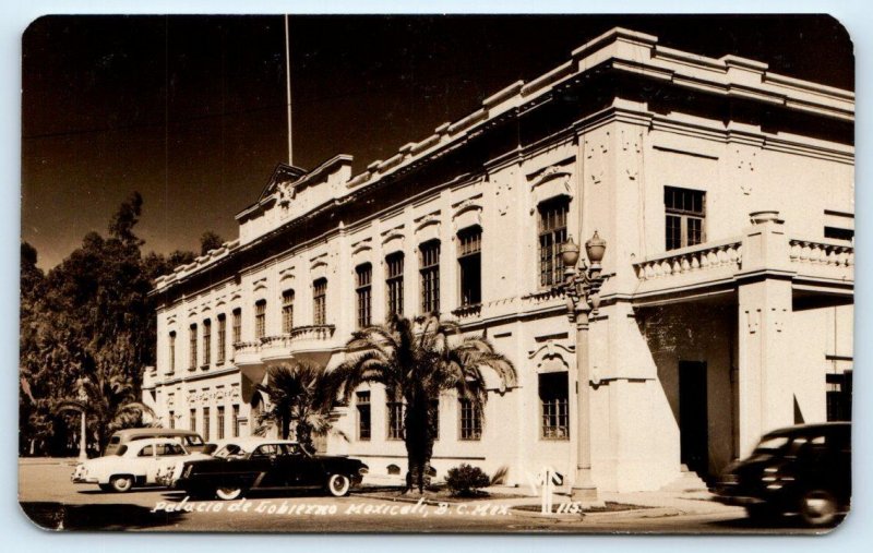 RPPC MEXICALI, Mexico ~ Street Scene GOVERNOR'S PALACE  c1950s Cars Postcard