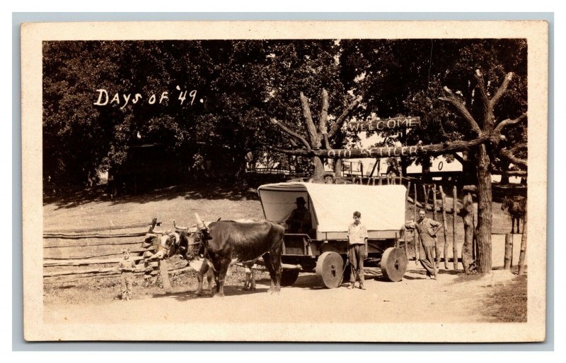 c1910 RPPC Welcome Old Settlers Days Of '49 Ox Drawn Covered Wagon Clinton Iowa