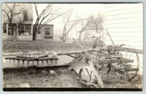 Real Photo Postcard~John Deere Farm Plow & Disc Across From Store~c1920 RPPC 