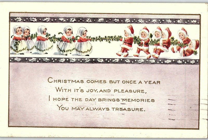 C.1910 Adorable Children as Santa & Mrs Claus Tug-o-War Victorian Postcard F36