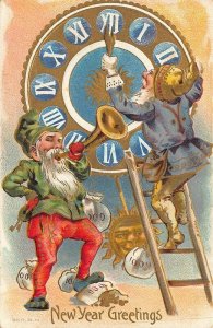 New Year Greetings Elves Bringing in The New Year Embossed Postcard