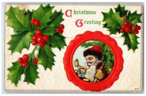 1910 Christmas Greetings Santa Claus With Toys Holly Berries Embossed Postcard
