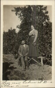 Man Woman Pose Orange Orchard c1910 Real Photo Postcard