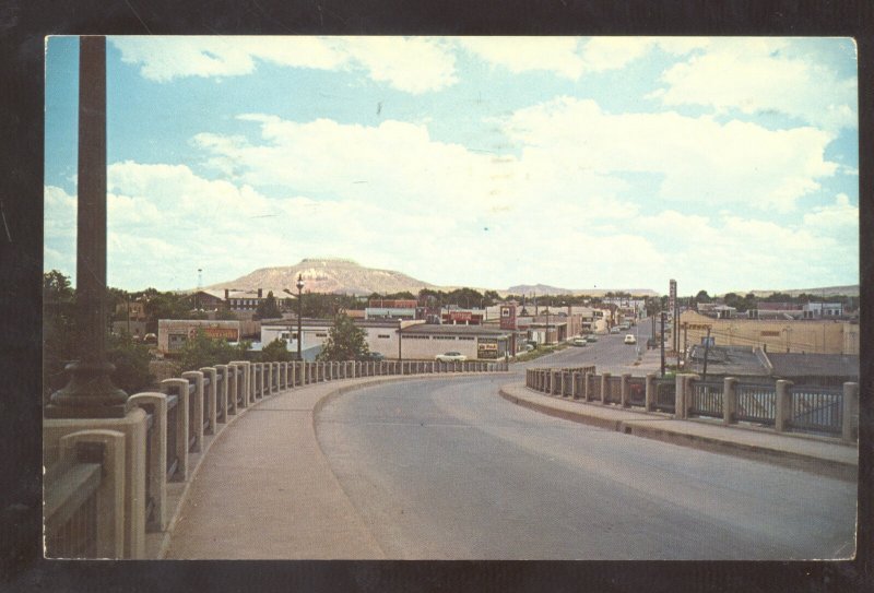 TUCUMCARI NEW MEXICO ROUTE 66 HIGHWAY STREET SCENE OLD CARS VINTAGE POSTCARD