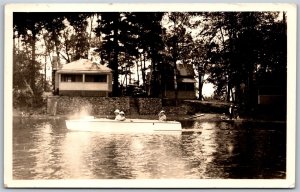 Postcard RPPC c1936 Cowansville Quebec Scenic View Cottage Boating Canoe
