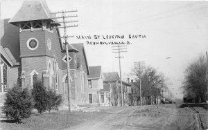 DC1/ Rushsylvania Ohio RPPC Postcard c1910 Main St South Homes Church 11