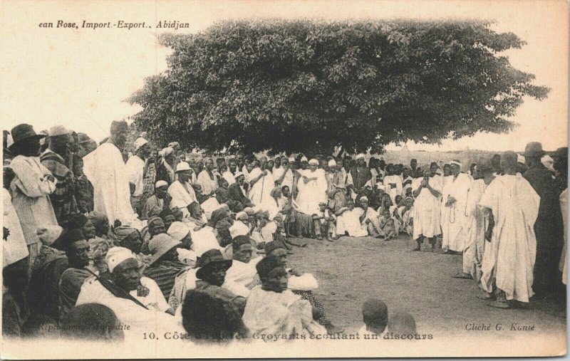 Ivory Coast Believers hear a speech Natives Côte d’Ivoire Vintage Postcard 04.15