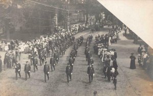 RPPC MILITARY POLICE OR FIRE PARADE REAL PHOTO POSTCARD (c. 1905)