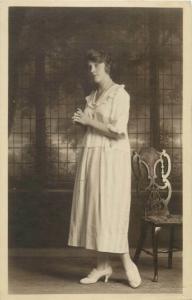 Women portraits near vintage chairs early photo postcards x 4