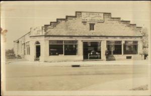 Campbell's New & Used Cars Dealership Showroom Real Photo Postcard WHERE?