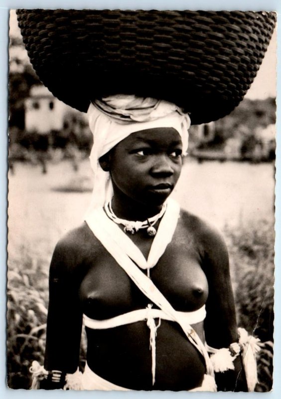 RPPC LIBERIA ~ Topless YOUNG WOMAN Carrying BASKET ~ 1962 Postcard