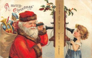 A MERRY CHRISTMAS Santa Claus & Girl On Telephone 1908 Embossed Vintage Postcard