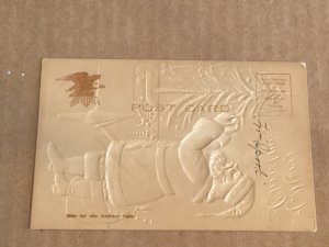 Santa decorating Tree & Toys embossed Grade 2