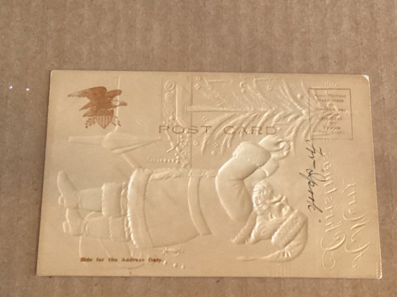 Santa decorating Tree & Toys embossed Grade 2