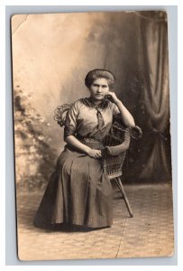 Vintage 1910's RPPC Postcard - Studio Portrait Victorian Woman in Parlor Chair