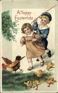 Easter Little Boy and Girl Chasing Hen and Chicks c1910 Vintage Postcard