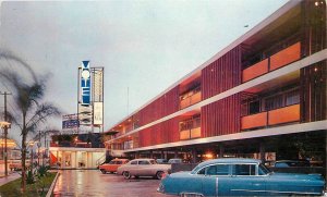 Postcard 1950s Louisiana St. Louis De Ville Mid-Town Hotel Night Autos LA24-3283