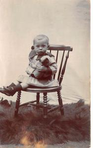 Child in a chair Child, People Photo Unused 