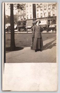 RPPC Lovely Edwardian Woman Street Pose Ornate Lamp Post c1910 Postcard D26