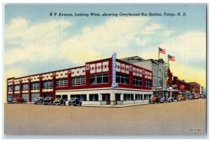 c1940 NP Avenue Looking West Greyhound Bus Station Fargo North Dakota Postcard