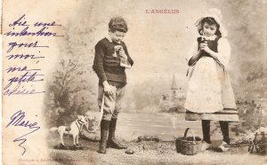Boy and girl praying. L'Angelus old vintage french postcard