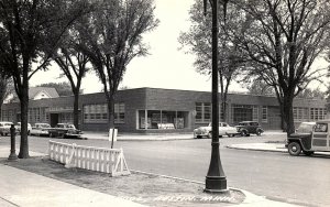 1950s AUSTIN MINNESOTA VOCATIONAL HIGH SCHOOL WILLYS WAGON RPPC POSTCARD P1299