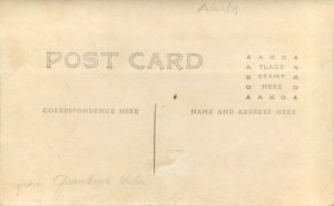 c1910 RPPC Postcard; Howling Malamutes Dog Team pulls Traditional Sled Alaska AK