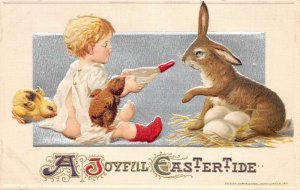 Joyful Eastertide Baby W/ Chicks Feeding Bottle To Bunny Winsch Vintage PC U4847