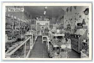 1951 Briggs Floral Shop Growing From Flower Glass Ovid Michigan Vintage Postcard
