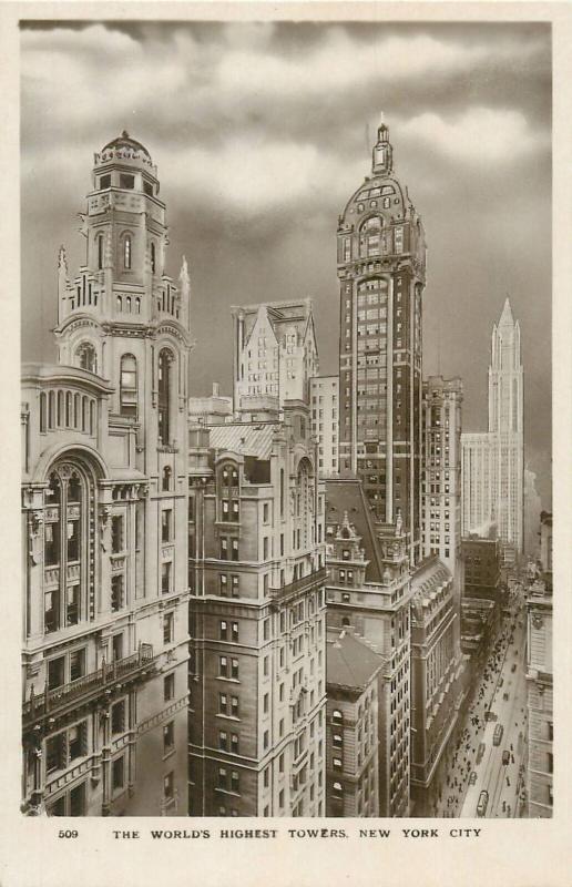 New York City world`s highest towers real photo postcard