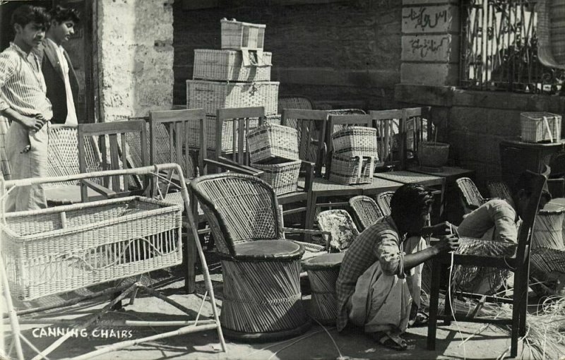 pakistan, Native Man Canning Chairs (1960) RPPC Postcard