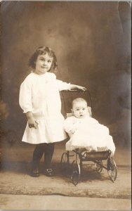 RPPC Victorian Children Harrison Elmer in Lois' Doll Buggy c1908 Postcard U12