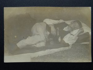 Social History AMBER ALE / BEER BOTTLE Drunk Gentleman Sleeps c1910 RP Postcard