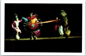 Postcard - Pueblo dancers performing The Belt Dance at night